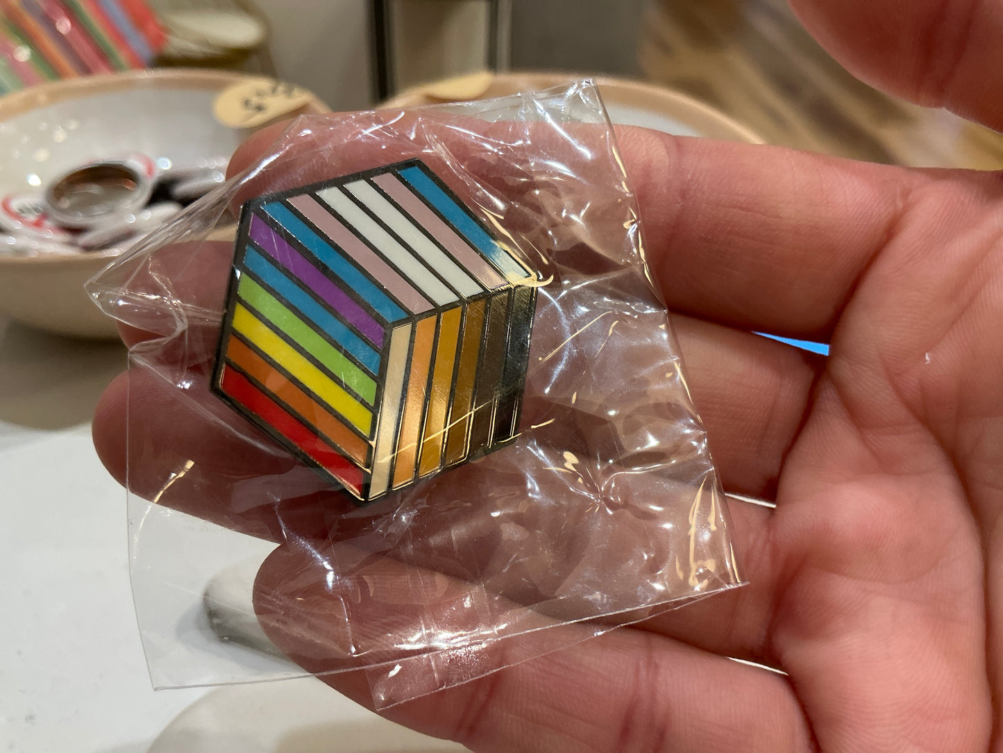 Trans cube enamel pin