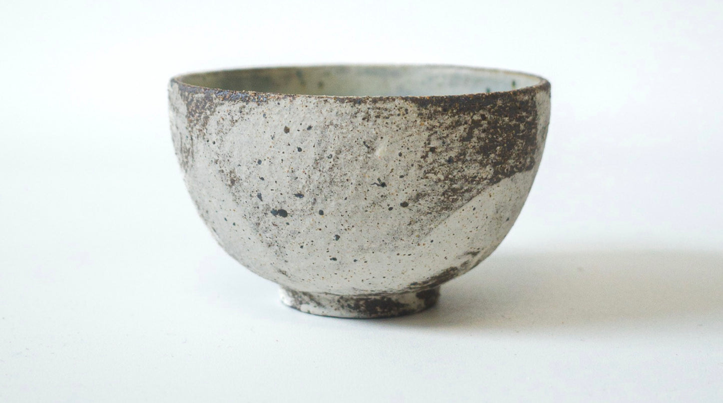 tea cup with white slip